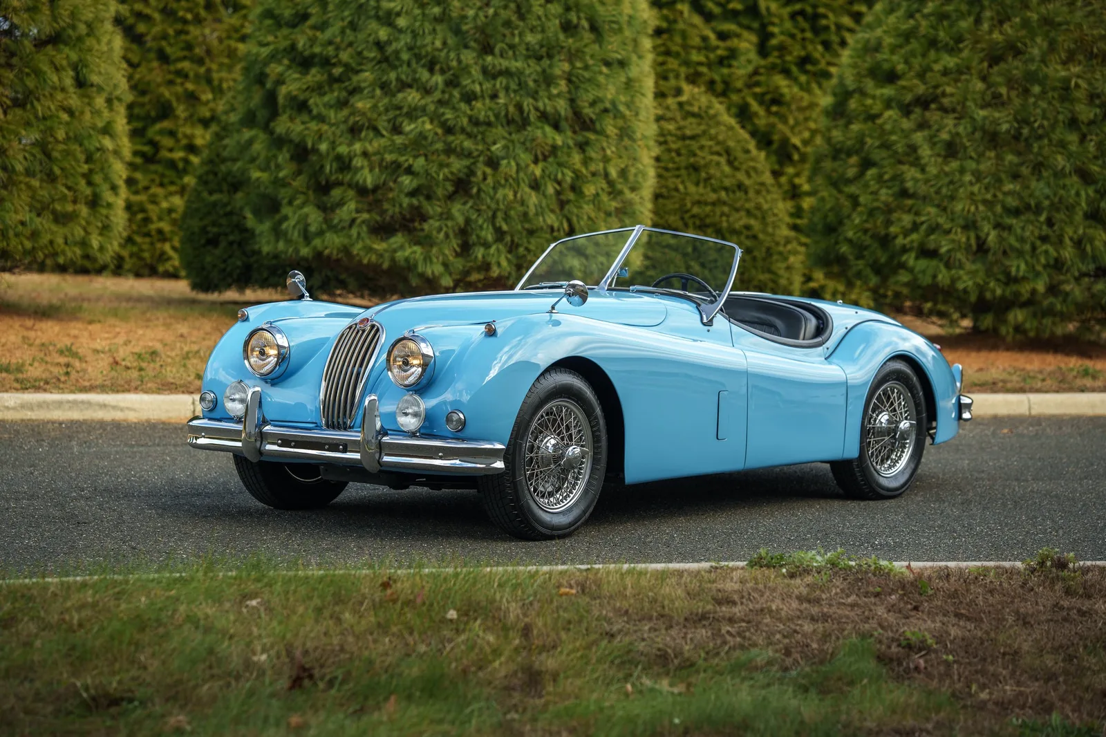 Blue 1954 Jaguar XK140 MC Roadster photographed by Drivers Select
